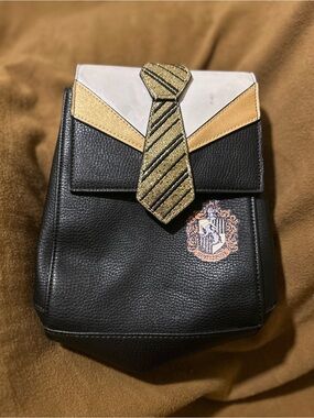 Harry potter Daniel’e Nicole Hufflepuff uniform mini back pack. New